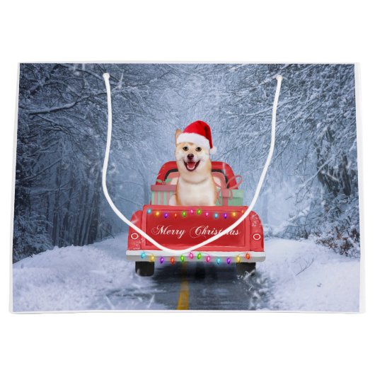 柴犬の犬が雪の中でクリスマストラックに座って ラージペーパーバッグ (正面)