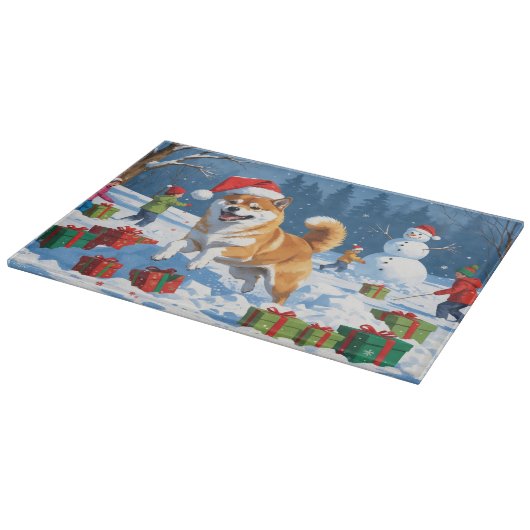 柴犬走のクリスマス帽子と雪の中 カッティングボード (角)