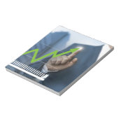 株価タッチスクリーンコンセプトを示す人 ノートパッド (回転)