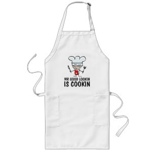 格好良い氏は男性へエプロンを調理しています ロングエプロン