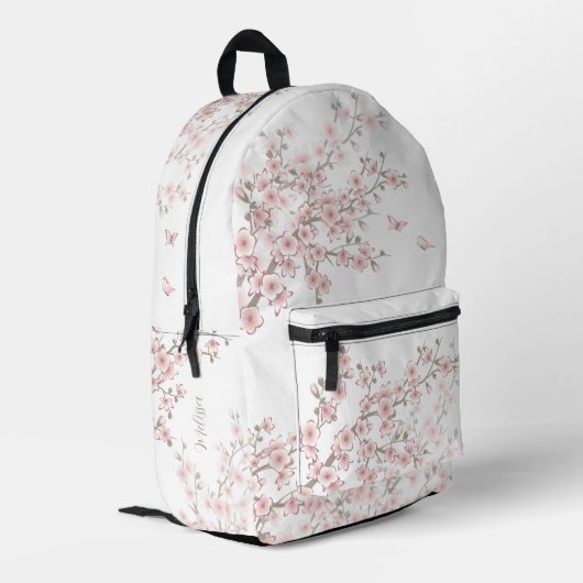 桜の花のピンクモノグラム プリントバックパック (裏面左端)