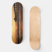 桟橋のビーチの日没 スケートボード (正面)