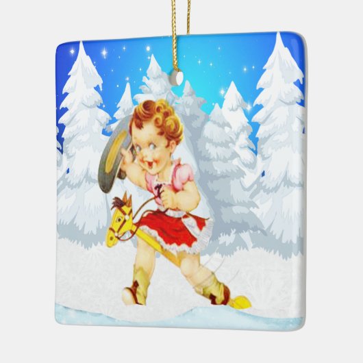 棒馬の冬場面の西部の小さい女性のカーボーイ セラミックオーナメント (左)
