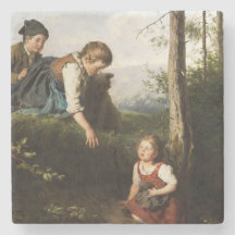 森で野生の果実を摘む3人の子供