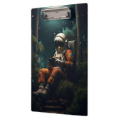 椅子に座っている宇宙飛行士 クリップボード (左)