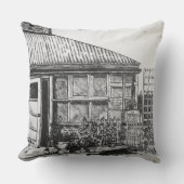 植物とフェンシングを持つ庭の犬のスケッチ クッション (正面)