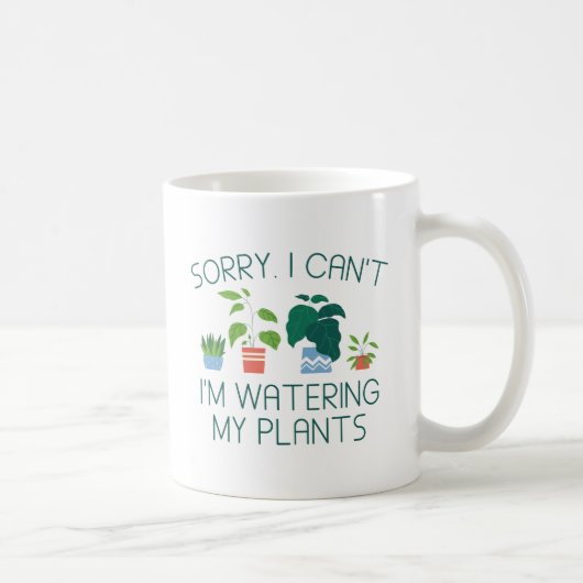植物に水をやっている コーヒーマグカップ (右)