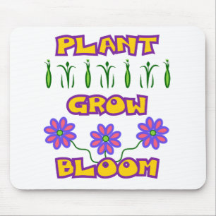 植物の成長開花引用文ピンクの花イエロー文字 マウスパッド