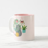 植物の間のおもしろい猫 ツートーンマグカップ (正面左)