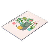 植物の間のおもしろい猫 ノートブック (左側)