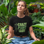 植物熱狂する婦人 Tシャツ<br><div class="desc">植物熱狂するの女性。植物おもしろいと緑の執着に関するカッコいいキュートな引用文の横にかわいらしつる植物と緑の色で植物の愛の贈り物。緑の素晴らし親指を持つ庭師のためのランドスケープ建築家ギフト。</div>