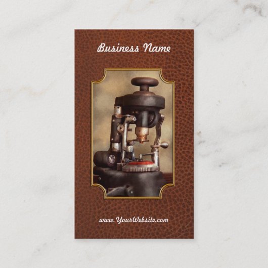 検眼 – レンズ切断機 名刺 (正面)