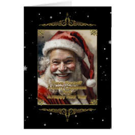 楽しいクリスマスの折り畳みカードを持っている