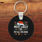 楽しいクリスマスの犬 すべての犬を撫でる可能性が最も高い キーホルダー (正面)