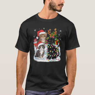 楽しいクリスマスの猫サンタクロースの帽子 クリスマスの喜び K Tシャツ