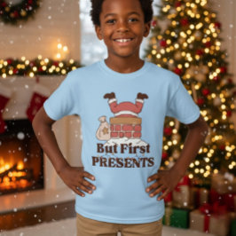 楽しいサンタ「でもまずはプレゼントを」子供Tシャツ Tシャツ