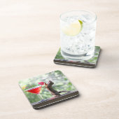 楽しい時間にカクテルを飲んでいるリス コースター (右側)