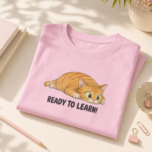 楽しく学ぼう オレンジの可愛い猫の女の子学生デザイン Tシャツ