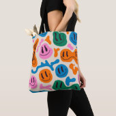 様々なカラフル溶け笑顔の顔。溶岩ランプ トートバッグ (クローズアップ)