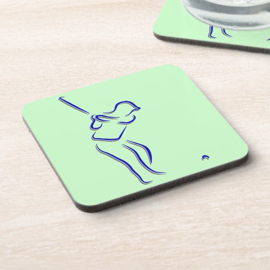 様式化されたゴルファーのシルエットのコルクのコースター コースター (左側)