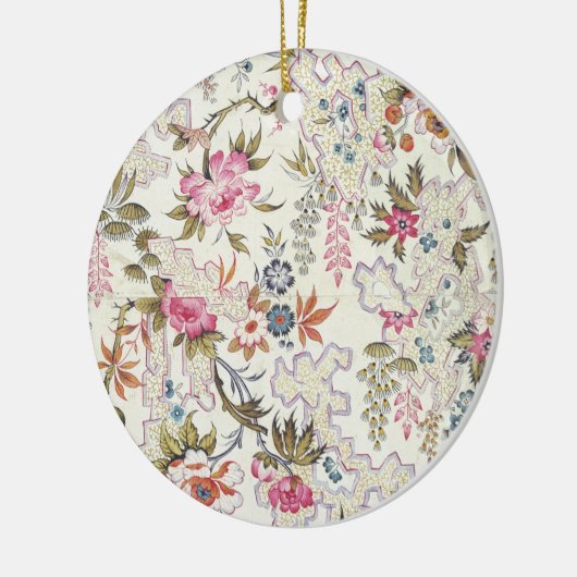 様式化された流れを用いる絹材料のための花柄 セラミックオーナメント (左)