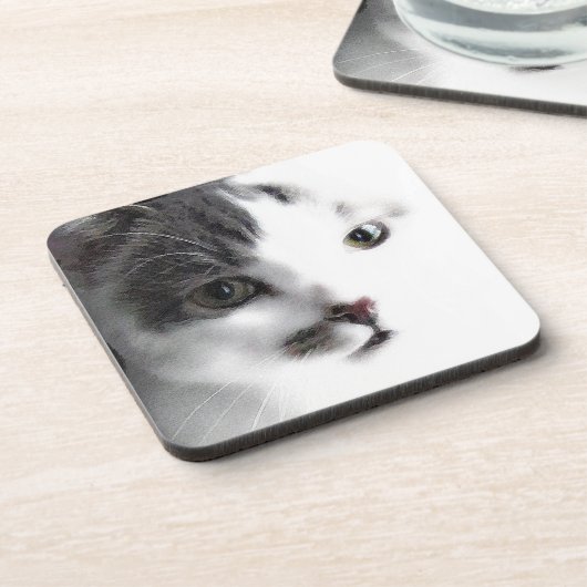様式化された猫の顔のクローズアップのコースターは(6)を置きました コースター (左側)