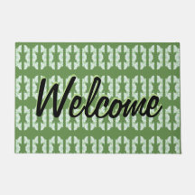 模様のある緑のドアマットかわいらし。