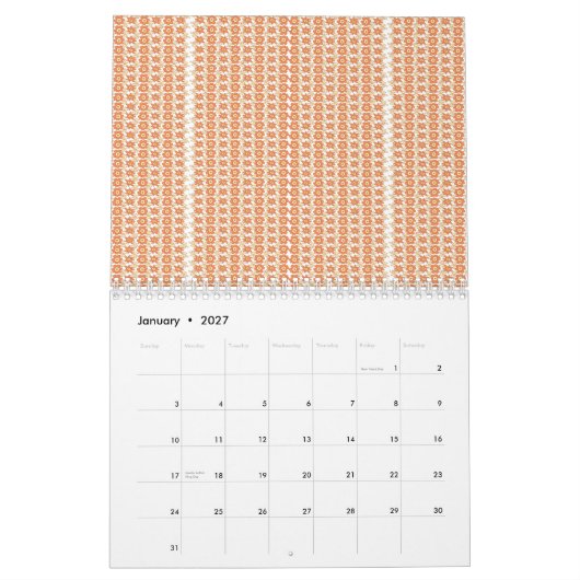 模様の入ったオレンジ色の敷物が平らに置かれている カレンダー (1月 2027)