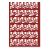 模様の入った赤い敷物が広がっている テーブルナンバー (裏面)