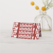 模様の入った赤い敷物が広がっている プレイスカード (裏面)