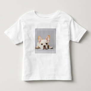 横になフランスのったブルドッグ トドラーTシャツ