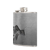 機械損傷の金属の背景 フラスク (左)