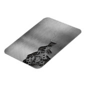 機械的な損傷を伴う金属背景 マグネット (左側)