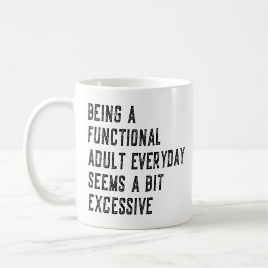 機能的な大人で日常的に不和なユーモアであるさま コーヒーマグカップ (左)