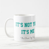 歌のコーヒー・マグの上の壊れ目 コーヒーマグカップ (左)