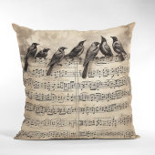 歌の鳥がミュージカルの作曲に座っている クッション