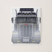 正面図のライトが付いている半黒のトラック ジグソーパズル (縦)