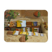 歩道で販売するアートワークを持つ小さな買い物 マグネット (横)