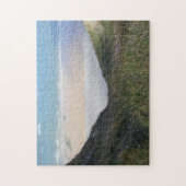 歩道の写真が付いている海景の草が茂った丘 ジグソーパズル (縦)