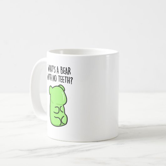 歯のない熊が熊のプンおもしろいを鳴らす コーヒーマグカップ (正面左)