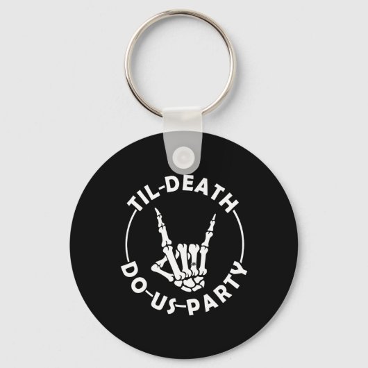 死ぬまでパーティしよう スケルトンの手に指輪をつけて キーホルダー (正面)