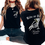 死ぬまで乗るか死ぬか我々はパーティーバチェロレッテ Tシャツ<br><div class="desc">私たちの"乗るしゃれているか死ぬ"シャツでパーソナライズされた、バチェロレッテにゴシックのtouchを追加し、"Til Death Do Weパーティー"テーマに最適。このシャツはダークエレガンスとおもしろいを融合させよくはしゃぐ、印象的なスケルトンの花嫁グラフィックと生意気な「死ぬまでパーティーを出す」スローガンを搭載したデザイン。ゴシックの美を鑑賞する人に結婚理想的なシャツは、あなたのお祝いを際立たせる。ブライダルパーティカスタマイズの各メンバーに対して、花嫁付きバチェロレッテとメイド・オブ・オーナー（花嫁付き添い人）の両方を含めおもしろい、これらのシャツは結束しスタイリッシュた外観を提供する。フロントとバックのプリントデザインは、すべての角度からスタイリッシュすべての人を保証する。あなたはハロウィーンをテーマにしたバチェロレッテを開催するか、単にゴシック様式の雰囲気を愛するかにかかわらず、これらのシャツはユニーク、お祭りに思い出に残るtouchを追加する。私たちパーソナライズされたの「ライドか死ぬ」シャツはパーティーのためだけではない。彼らはまた、あなたのブライダルパーティが大切にしてくれる形見だ。マルティニのガラス詳細を追加しよくはしゃぐて、デザインに要素を持って、これらのシャツはハロウィーンのバチェロレッテの好意や友人のための特別な贈り物として理想的である。お祝し結婚は、おもしろいとバチェロレッテの統一を体現するシャツを着て、夜が忘れられない時を確かめスタイリッシュている。</div>