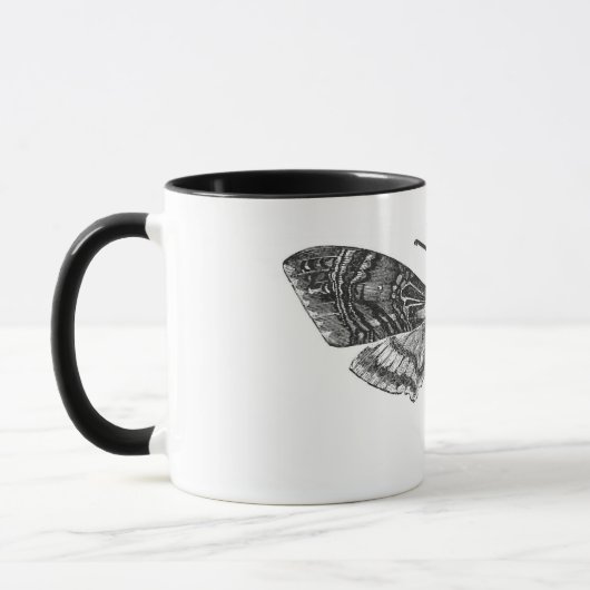 死の頭部のガのマグ マグカップ (左)