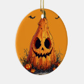残忍な顔でカボチャをニヤニヤさせる セラミックオーナメント (右)