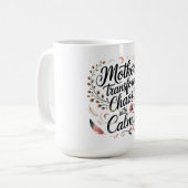 母なる者が混沌を静かに変える コーヒーマグカップ (正面左)