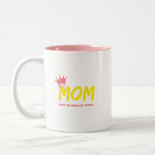 母は世界を丸める。 ツートーンマグカップ (左)