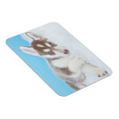 毛布に小さなかすぼらしい子犬が寝そべる マグネット (右側)