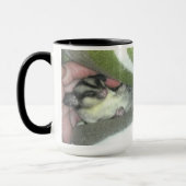 毛布に眠る砂糖滑空機 マグカップ (左)