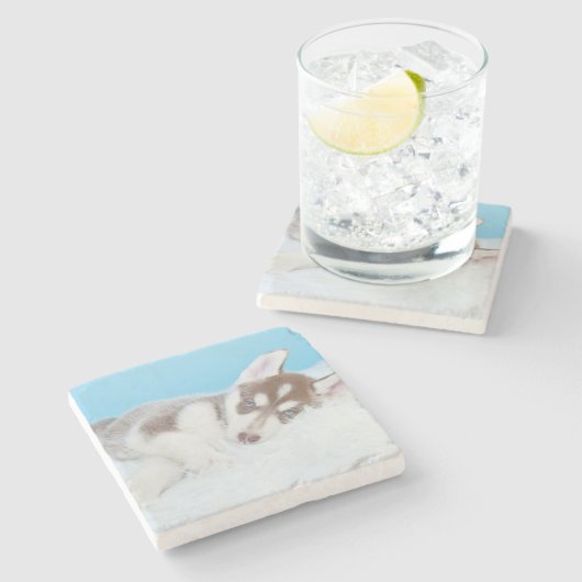 毛布の上に横たわる小柄なかすれた子犬 ストーンコースター (横)