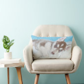 毛布の上に横たわる小柄なかすれた子犬 ランバークッション (椅子)